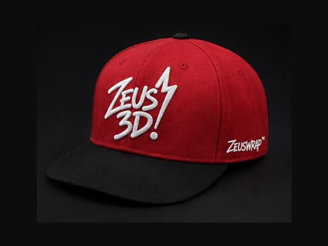 Zeus 3D snapback cap in red with a black brim and a raised white embroidered logo.